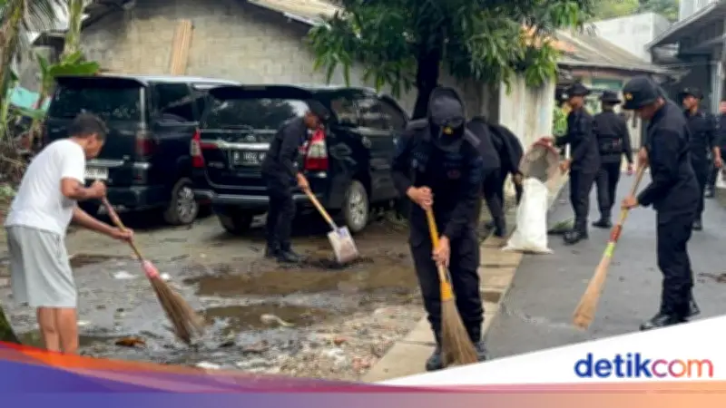 Brimob Polda Metro Jaya Wujudkan Jakarta ASRI dan Santuni Anak Yatim
